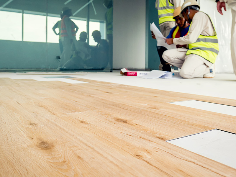 worker installing vinyl flooring lawndale ca